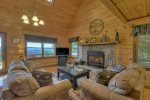 Sunrock Mountain Hideaway - Living room with fireplace 